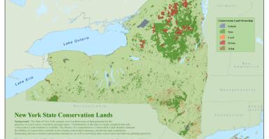 Map of New York State showing the conserved lands in different colors.