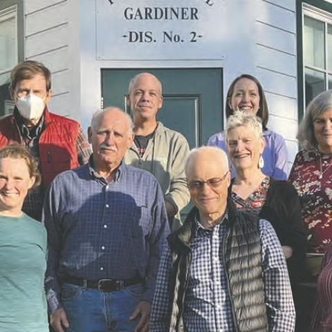 Members of the Gardiner CPP committee stand in front of the Gardiner town hall.