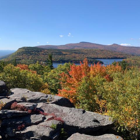 Autumn view of Catskills over North South Lake from rocky outcrop.
